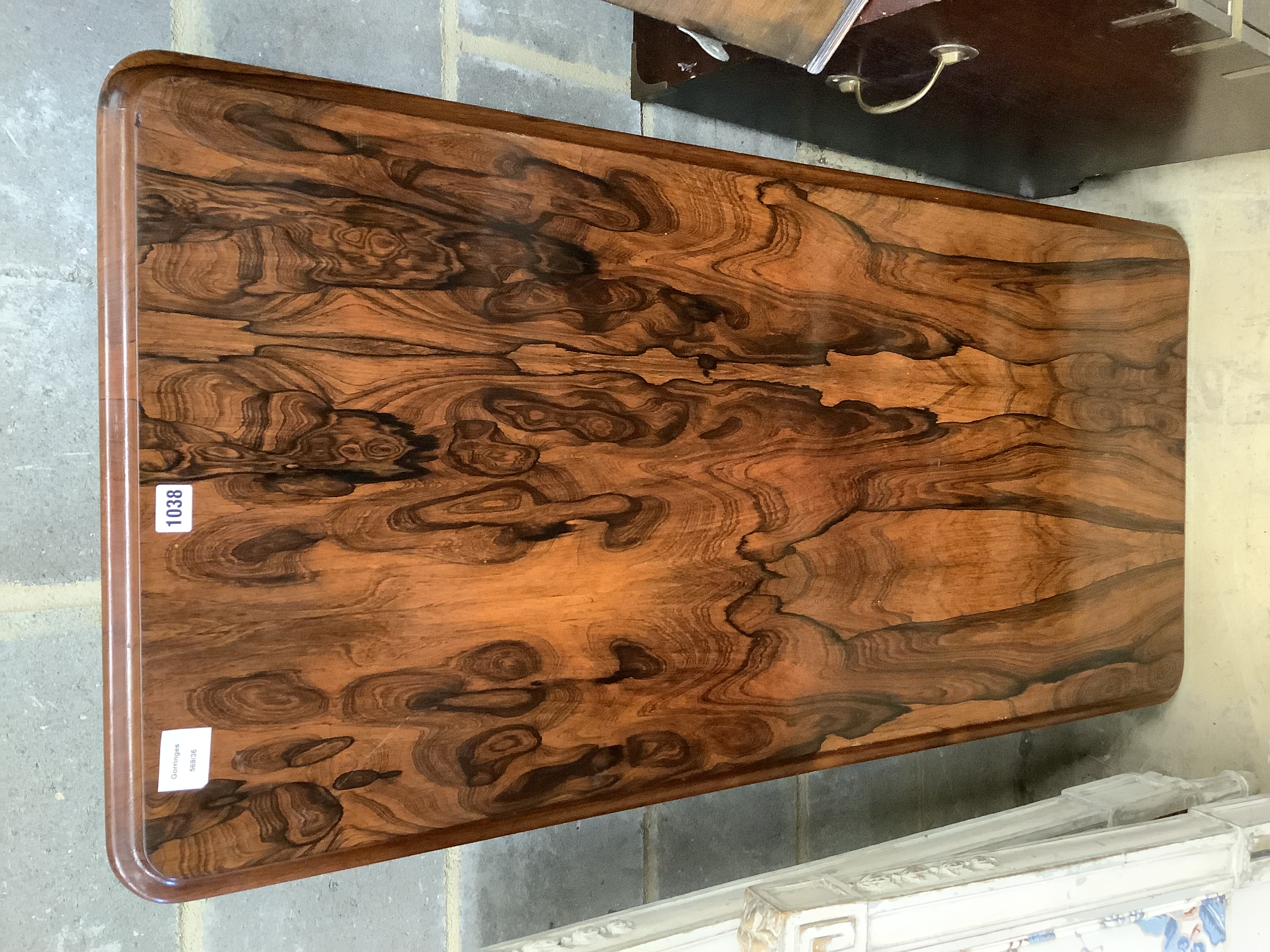 A Victorian rosewood centre table (no fixing bolts), width 122cm, depth 58cm, height 68cm